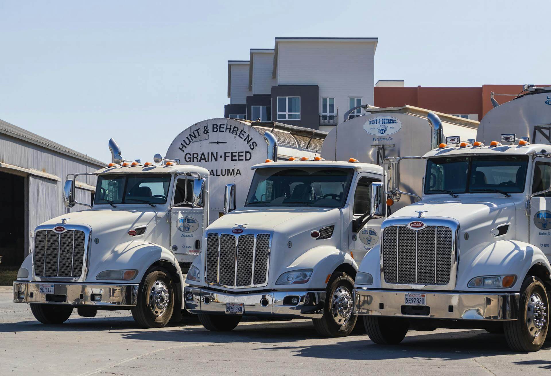 3 trucks standing next to each other